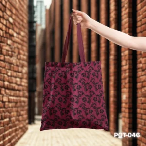 Crimson Blossom Tote Bag with Black Floral Damask Pattern on Red Background PQT-046, Rich Crimson Shopping Bag featuring Elegant Brocade Style Botanical Print, Durable Polyester Tote Bag with Dark Victorian Floral Art PQT-046, Deep Red Tote Bag with Black Ornate Flower and Leaf Silhouette Design PQT-046