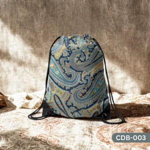 "Rawayat Drawstring Bag with Blue and Yellow Paisley Pattern Print CDB-003", "Elegant Traditional Indian Style Sling Bag featuring Intricate Paisley Design", "Durable Polyester Drawstring Bag with Classic Blue Paisley Art CDB-003".