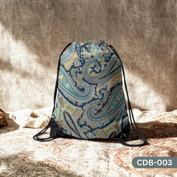 "Rawayat Drawstring Bag with Blue and Yellow Paisley Pattern Print CDB-003", "Elegant Traditional Indian Style Sling Bag featuring Intricate Paisley Design", "Durable Polyester Drawstring Bag with Classic Blue Paisley Art CDB-003".