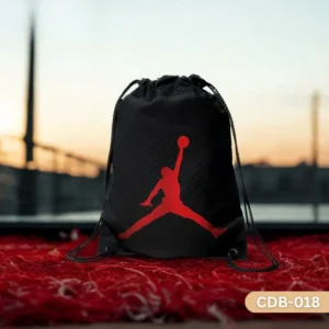 "Jetstream Jordan Drawstring Bag with Red Jumpman Basketball Logo on Black Background CDB-018", "Black Sling Bag featuring Michael Jordan Silhouette Emblem in Red", "Durable Polyester Sports Bag with Iconic Jordan Brand Design CDB-018".