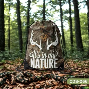 "Wilderness Trail Drawstring Bag with Camouflage Antlers and Nature Quote Print CDB-066", "Durable Camo Hunting Themed Sling Bag with Deer Antlers", "Outdoor Adventure Polyester Drawstring Bag CDB-066 It's in my Nature".