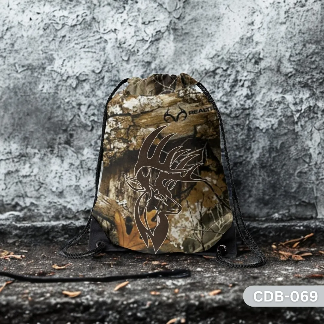 "Predator Mark Drawstring Bag with Realtree Camo and Buck Outline Design CDB-069", "Hunting Themed Sling Bag featuring Deer Silhouette on Camouflage Pattern", "Durable Outdoor Polyester Drawstring Bag with Realtree Camo and Buck CDB-069".
