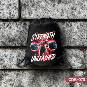 "Iron Titan Drawstring Bag CDB-073 - Strength Unleashed Powerlifter Graphic", "Durable black and red gym bag with weightlifter design", "Intense workout Strength Unleashed sling bag".