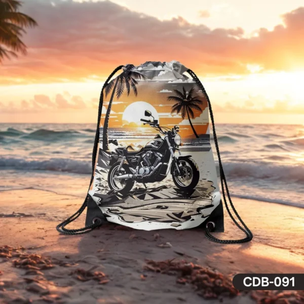 Coastal Cruise drawstring bag featuring a detailed print of a classic motorcycle parked on a sandy beach with palm trees against a vibrant sunset over the ocean.