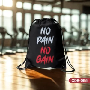 Iron Will black drawstring bag with 'NO PAIN NO GAIN' printed in bold white and red distressed lettering, displayed on a wooden surface in a gym.