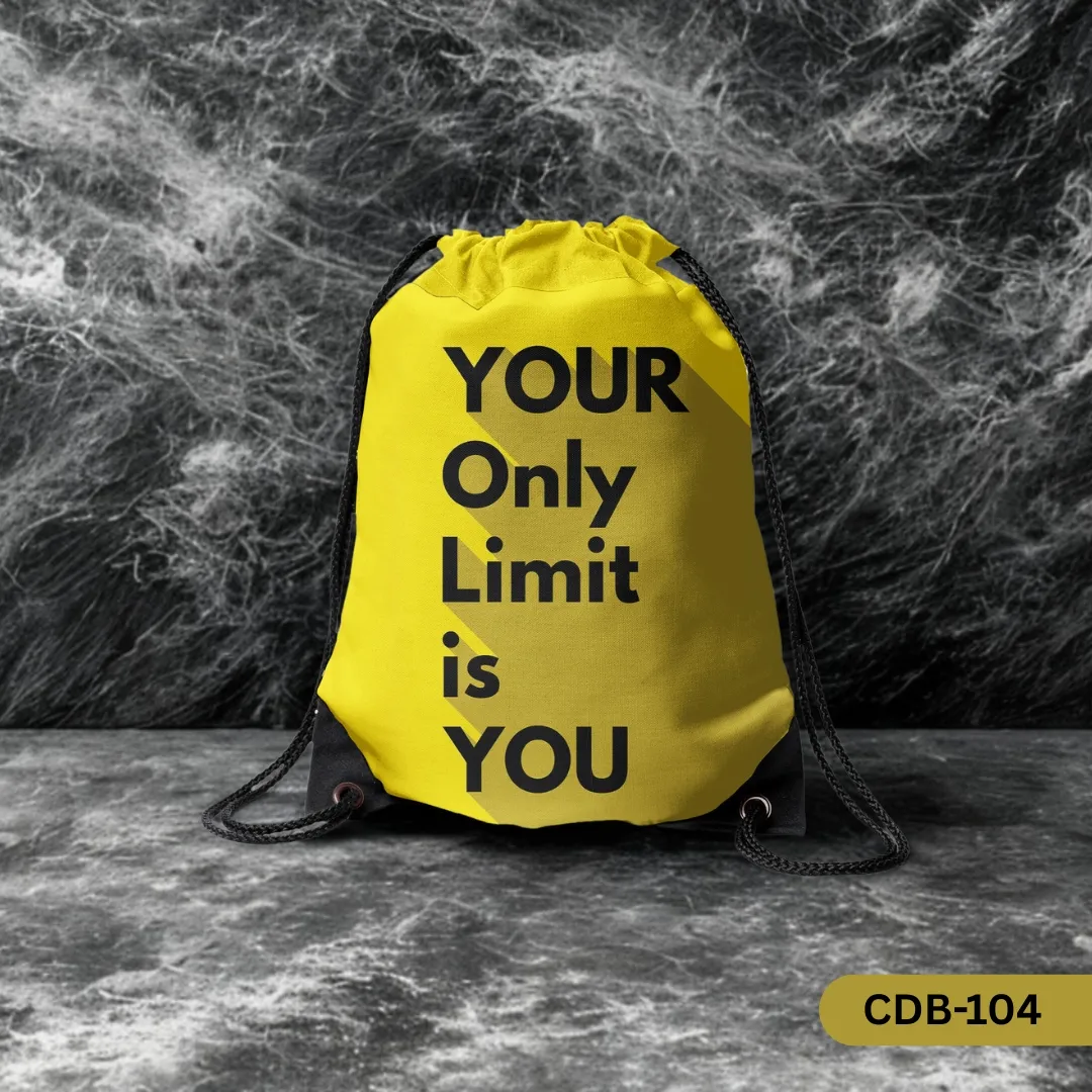 Limitless Spark yellow drawstring bag with 'YOUR Only Limit is YOU' quote in black text, against a textured dark background."