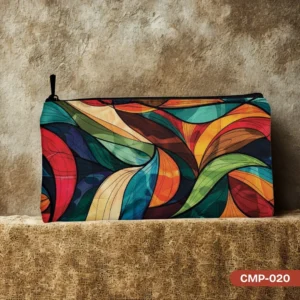 Prism Palette Makeup Pouch (CMP-020) featuring a vibrant abstract design with flowing, jewel-toned colors reminiscent of stained glass, displayed on a textured background.