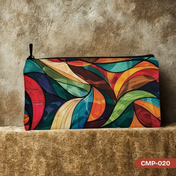 Prism Palette Makeup Pouch (CMP-020) featuring a vibrant abstract design with flowing, jewel-toned colors reminiscent of stained glass, displayed on a textured background.