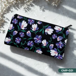Aria Bloom Makeup Pouch (CMP-021) showcasing an elegant print of white and indigo-violet flowers on a black background, conveying sophisticated style.