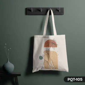 Poetic Hold Tote Bag (PQT-105), a white canvas tote, featuring a minimalist line art design of a hand holding a stylized flower, accented with abstract earthy-toned color blocks (terracotta, beige, muted teal), hanging from a dark grey peg rack against a dark teal wall, with a teal vase and dried flowers on a small black table to the left.