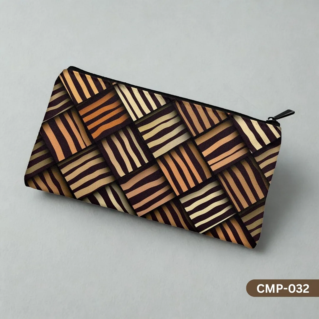The Strata Makeup Pouch with a 3D woven, striped pattern in earthy brown and orange tones, displayed on a clean grey background.